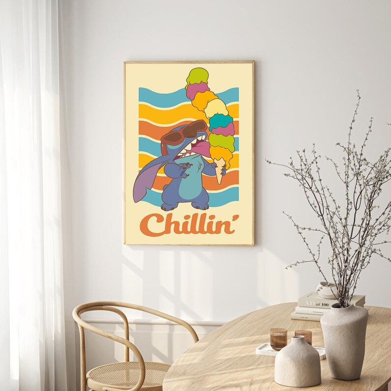 May include: A retro-style poster featuring a blue cartoon character with sunglasses eating a multi-colored ice cream cone. The background is a yellow and orange striped pattern with the text "Chillin'" in orange letters.