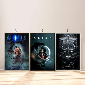 May include: Three movie posters featuring the Alien franchise. The first poster is for "Aliens" and features a dark blue alien creature with a human character holding a gun. The second poster is for "Alien: Director's Cut" and features a close-up of a woman's face in a space helmet. The third poster is for "Alien" and features a dark, abstract image of the alien creature.