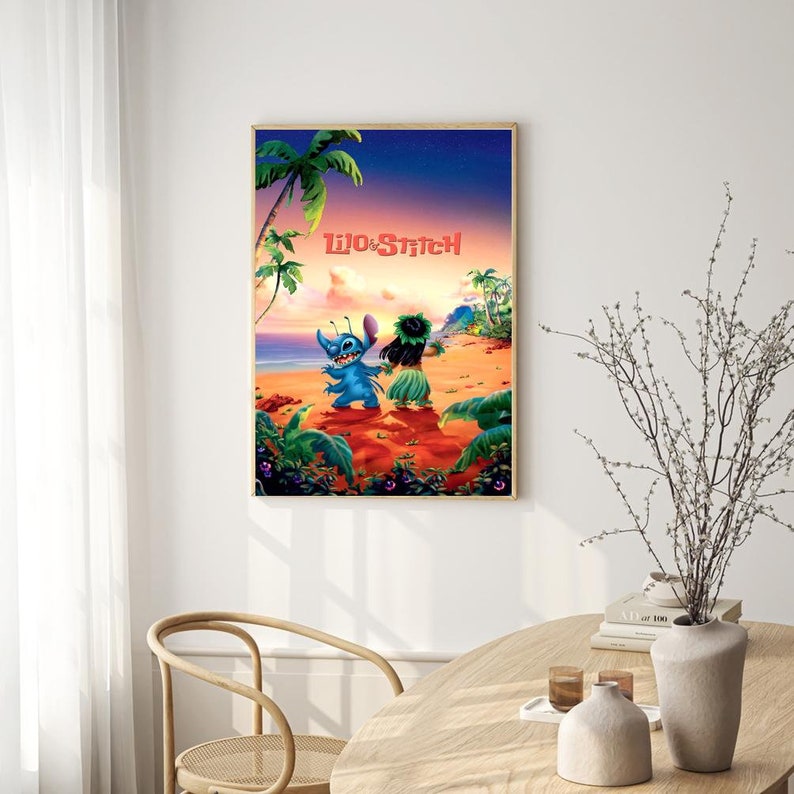 May include: A colorful illustration of Lilo and Stitch from the Disney movie Lilo & Stitch. The image shows Lilo and Stitch walking on a beach with palm trees in the background. The text "Lilo & Stitch" is written in red and white letters at the top of the image.
