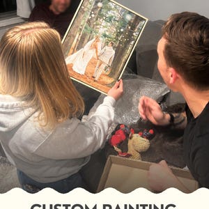 May include: A rectangular framed painting depicting a wedding couple walking hand-in-hand through a forest path illuminated by hanging string lights. The artwork features a bride in a white gown and a groom in a light-colored suit, rendered in a realistic style.