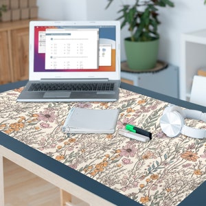 floral desk pad on a desk in the house
