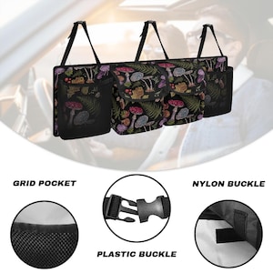 May include: Black car organizer with a colorful mushroom and fern pattern. Features multiple pockets, grid pocket, and nylon and plastic buckles. Designed to hang from the car's headrests.
