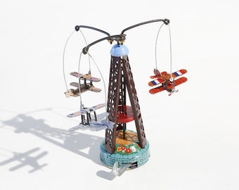 Biplane Carousel. Tin Toy / Retro / Clockwork Fairground Toy