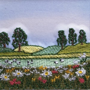 English summer wild flower meadow with sheep, embroidered picture