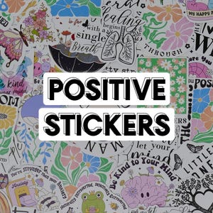 May include: A collection of colorful stickers with various designs and inspirational quotes. The text "POSITIVE STICKERS" is prominently displayed. The stickers feature floral patterns, butterflies, and other uplifting imagery.