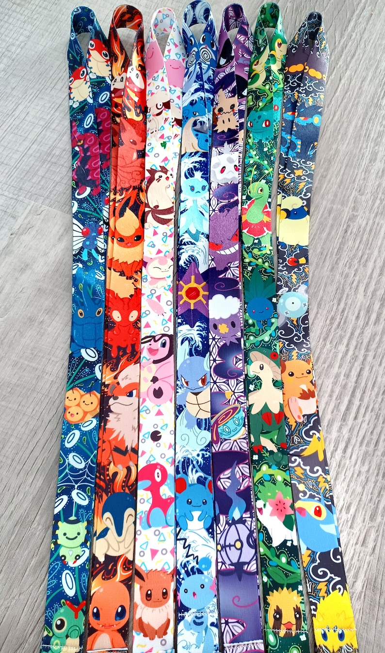 May include: A set of ten colorful lanyards featuring various Pokemon characters. The lanyards are made of a soft, durable material and are perfect for holding keys, ID badges, or other small items.