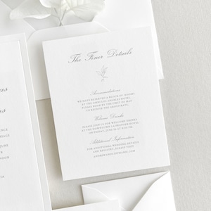 Classic Details Card: script font for headers and block font for main text. A hand-drawn floral sprig is placed between the header and main text