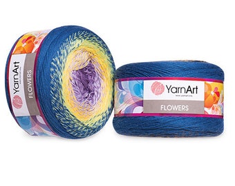 May include: Two skeins of YarnArt Flowers yarn in a blue and yellow ombre colorway. The yarn is packaged in a blue and white label with the brand name YarnArt and the yarn name Flowers.