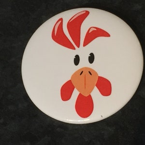 Fun chicken badge with funky chicken face