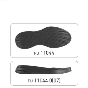 May include: Two black shoe soles, one with a textured surface and the other with a smooth surface. The soles are labeled "PU 11044" and "PU 11044 0(07)".