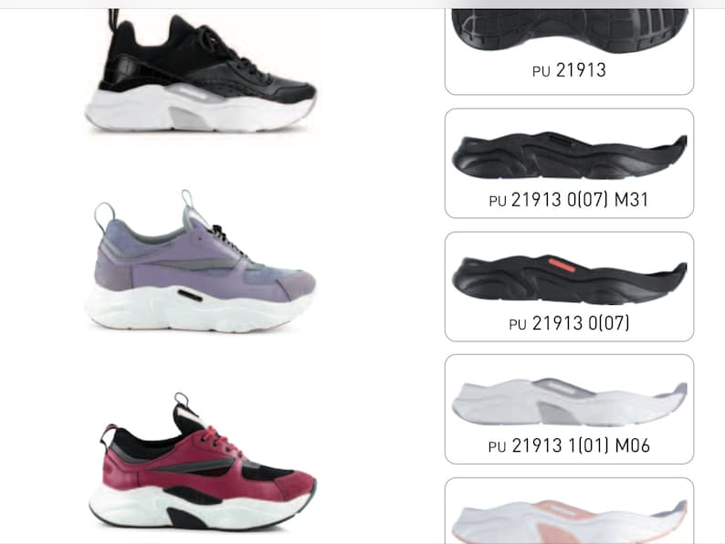 May include: Four different views of a black, purple, and red sneaker with a thick white sole. The sole is shown separately in each view. The text "PU 21913" is visible on the sole.