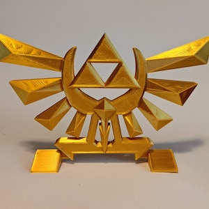 Zelda Hyrule&#39;s Crest Stand Cake Topper - Perfect for Gaming Enthusiasts and Zelda Fans!