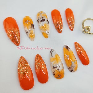 orange flower nail design
