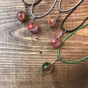 Vintage marbles crafted into pendant necklaces