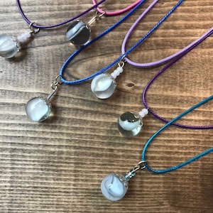 Vintage marbles crafted into pendant necklaces