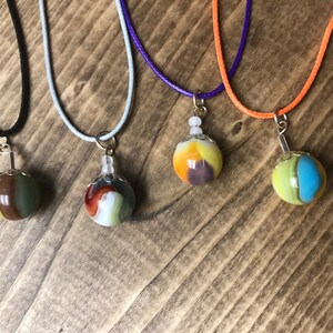 Vintage marbles crafted into pendant necklaces