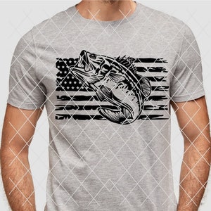 K&ouml;nnte beinhalten: Ein graues T-Shirt mit einer schwarz-wei&szlig;en Grafik eines Fisches, der aus einer notleidenden amerikanischen Flagge springt.