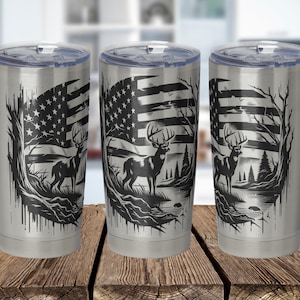 May include: Three stainless steel tumblers with a black and white design of a deer standing in front of an American flag.