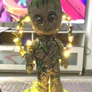 Baby Groot -With floral decoration to choose from and LED lights