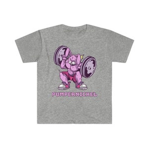 May include: A gray t-shirt featuring a cartoon rabbit lifting weights. The rabbit is pink and muscular, wearing pink shorts and sneakers. The text "PUMPERNICKEL" is printed below the rabbit in pink.