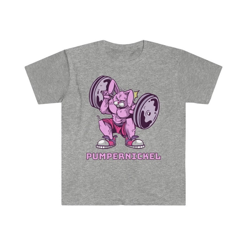 May include: A gray t-shirt featuring a cartoon rabbit lifting weights. The rabbit is pink and muscular, wearing pink shorts and sneakers. The text "PUMPERNICKEL" is printed below the rabbit in pink.