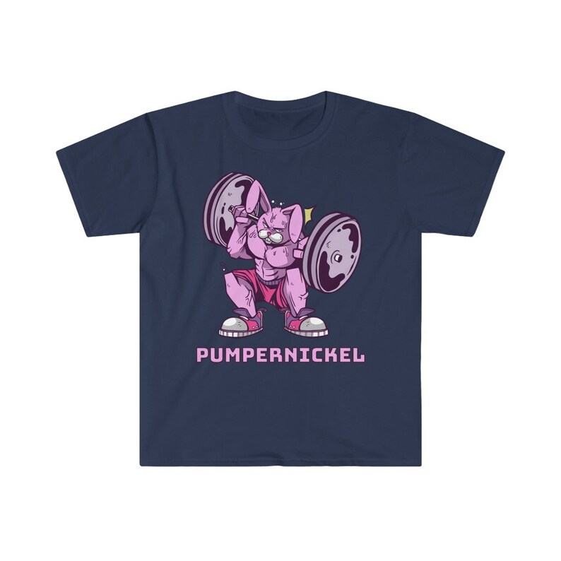 May include: Navy blue t-shirt featuring a cartoon rabbit lifting weights. The rabbit is pink and muscular, wearing pink shorts and sneakers. The text "PUMPERNICKEL" is printed in pink below the rabbit.