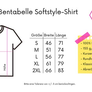 May include: A white t-shirt size chart with measurements in centimeters. The chart includes sizes S to 2XL, with corresponding width and length measurements. Additional details include 100% cotton, short sleeves, and a classic fit.