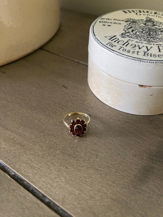 Vintage 14k Gold Garnet Halo Ring - image 1