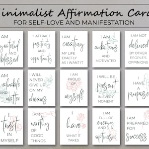 May include: Set of 16 minimalist affirmation cards with white backgrounds and black text. The cards feature positive affirmations for self-love and manifestation. Some cards have floral illustrations in pink and green.