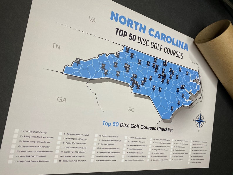 May include: A map of North Carolina with blue and white colors showing the top 50 disc golf courses in the state. The map includes a checklist of the courses with their names and locations.