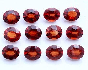 Natural Red Hessonite Garnet: Oval Faceted Gemstone (10x12 mm)