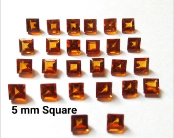 May include: Twenty-five 5 mm square orange gemstones. 5 mm Square.