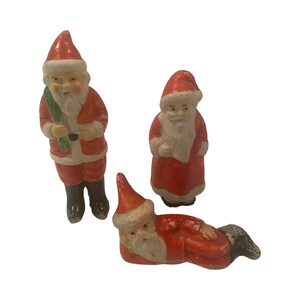 Trio of Antique Bisque Santa Claus Figures