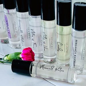 Glass roller bottles for perfume oil. Roll on application. Holds 10 ml of perfume.