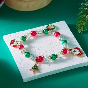 Pulsera con dijes navideños / Papá Noel / Presente / Árbol de Navidad / Regalo