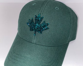 Emerald crystallized ROOTS maple leaf baseball cap