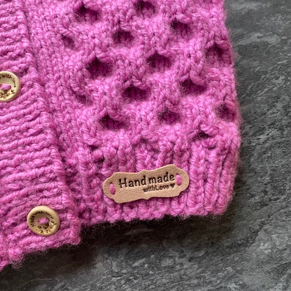 BRAND NEW HAND KNITTED BABY GIRLS  PINK ARAN CARDIGAN WITH COLLAR 
