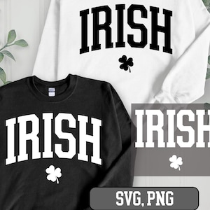 Puede incluir: Dos sudaderas, una blanca y otra negra, cada una con la palabra "IRISH" en letras de bloque en negrita. Debajo de la palabra hay un pequeño trébol. La esquina inferior derecha de la imagen muestra el texto "SVG, PNG".