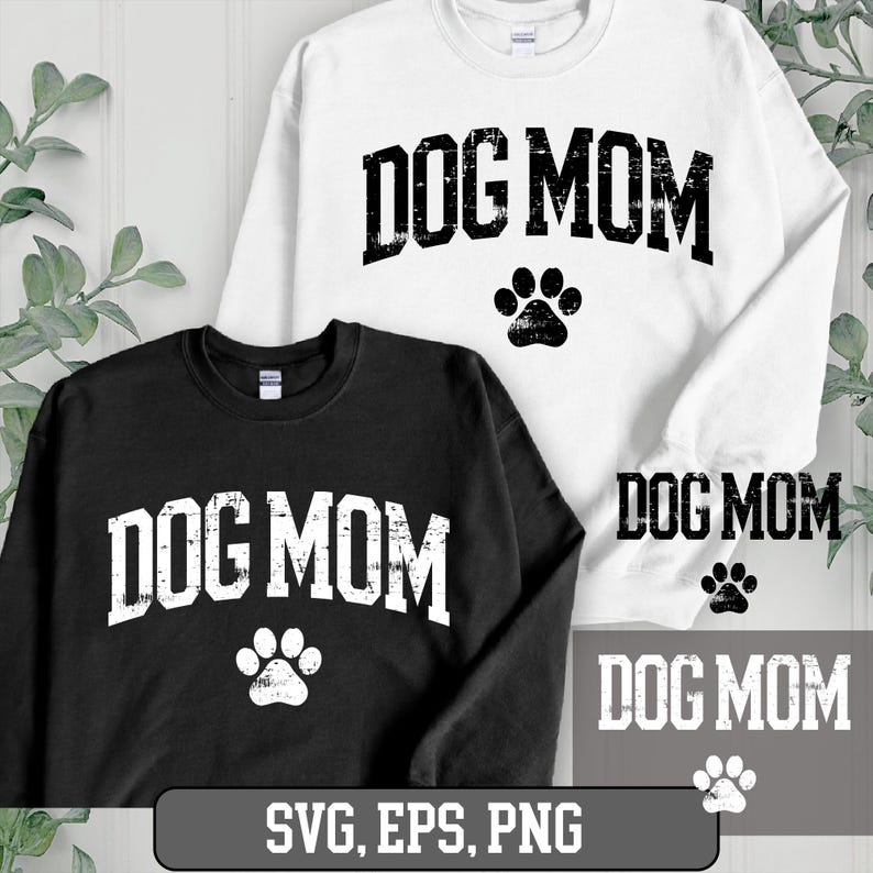 May include: Two black and white sweatshirts with the text "DOG MOM" in a distressed font. The sweatshirts have a paw print graphic below the text. The text "SVG, EPS, PNG" is at the bottom of the image.