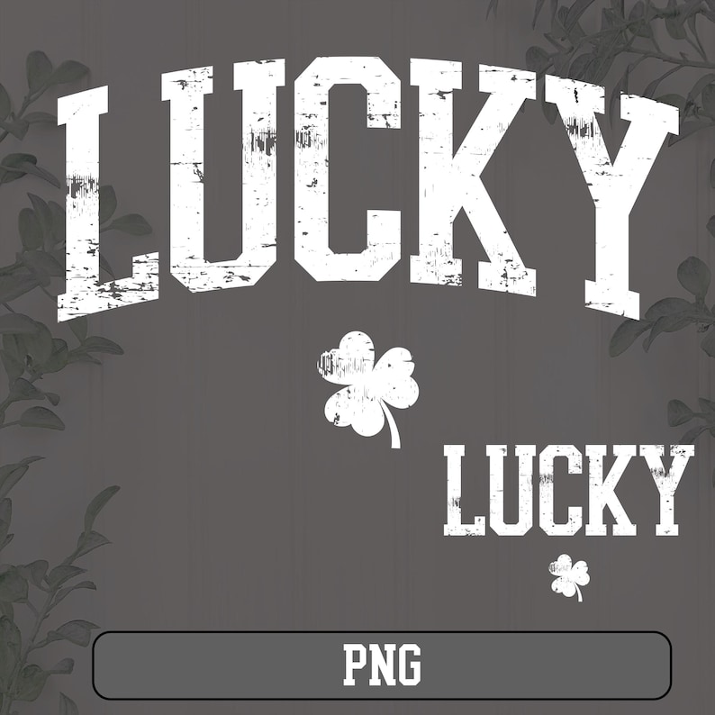 May include: White distressed text that reads "LUCKY" with a white shamrock below it. The text "LUCKY" appears again in smaller text below the shamrock. The background is a dark gray.
