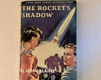 The Rocket’s Shadow by John Blaine
