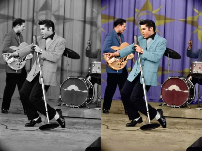 May include: A black and white and color photograph of a man singing into a microphone on a stage. He wears a light blue jacket, black pants, and black shoes. Other musicians play guitars and drums in the background.