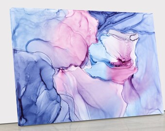 May include: A rectangular canvas print featuring an abstract alcohol ink design with flowing, translucent layers of deep navy blue, soft pastel pink, and light periwinkle purple, creating organic, cloud-like shapes across the surface.