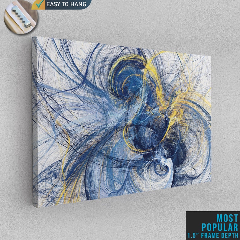 May include: Abstract canvas art print featuring a swirling design in shades of blue and yellow. The artwork has a white background and is labeled "EASY TO HANG" and "MOST POPULAR 1.5" FRAME DEPTH".