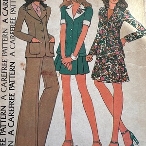 May include: Vintage sewing pattern featuring three women's fashion designs. The designs include a brown pantsuit, a green dress with white trim, and a floral print suit. The image has the text "A CAREFREE PATTERN" repeated vertically.