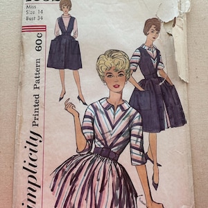 May include: Vintage Simplicity sewing pattern number 4092 for a dress. The pattern is for a miss, size 14, bust 34. The pattern includes three different styles of dresses, one with a striped bodice and a full skirt, one with a sleeveless bodice and a full skirt, and one with a sleeveless bodice and a shorter skirt.