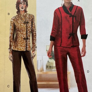 May include: A sewing pattern for a two-piece outfit. The pattern includes a long-sleeved top with a mandarin collar and a pair of pants. The top is shown in red with black trim, and the pants are shown in red. The pattern is labeled with the letters A, B, C, and D.