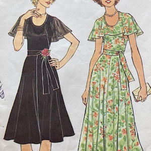May include: Two women's dress patterns. The dress on the left is black with a sheer overlay on the sleeves. The dress on the right is a floral print with a green background. The text "NO EXCHANGE OR RETURN ON PATTERNS" is at the top of the image.