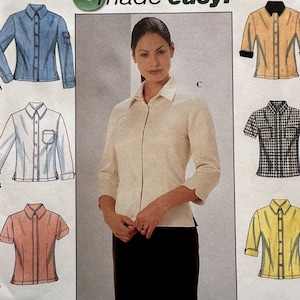May include: A sewing pattern featuring a woman wearing a cream-colored blouse with a zipper closure. The pattern includes illustrations of various shirt styles, including a denim shirt, a white shirt, and a yellow shirt. The text "6 made easy!" is visible.