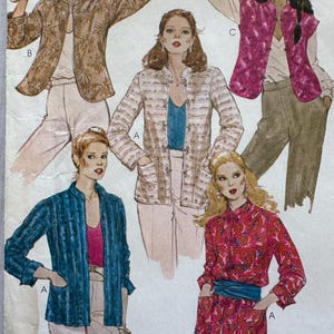 May include: A pattern sheet featuring illustrations of various jackets and blouses. The jackets are in different colors and patterns, including floral, striped, and solid blue. The text "Blouses not included" is visible at the bottom.
